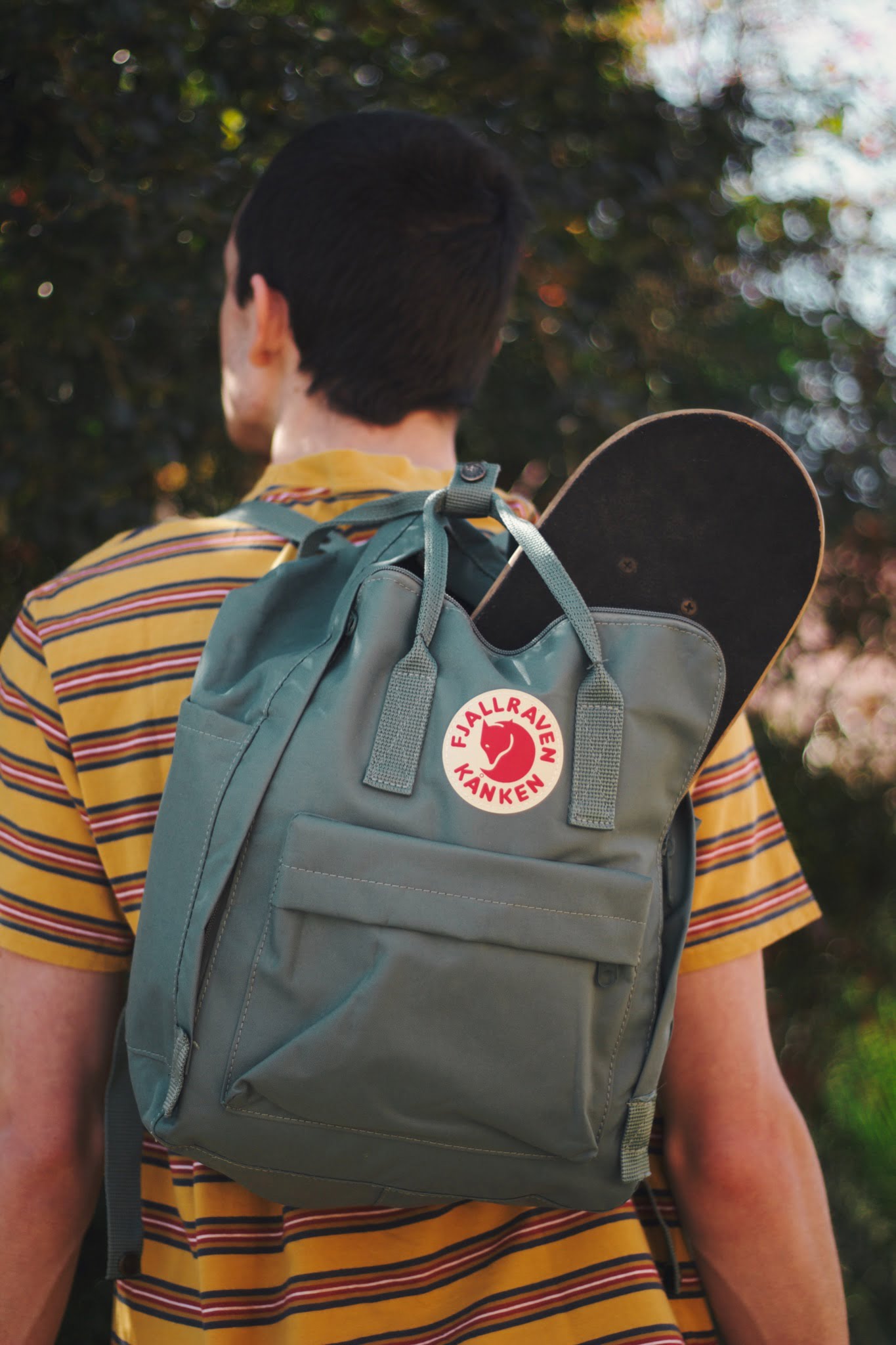 backpack with skateboard inside