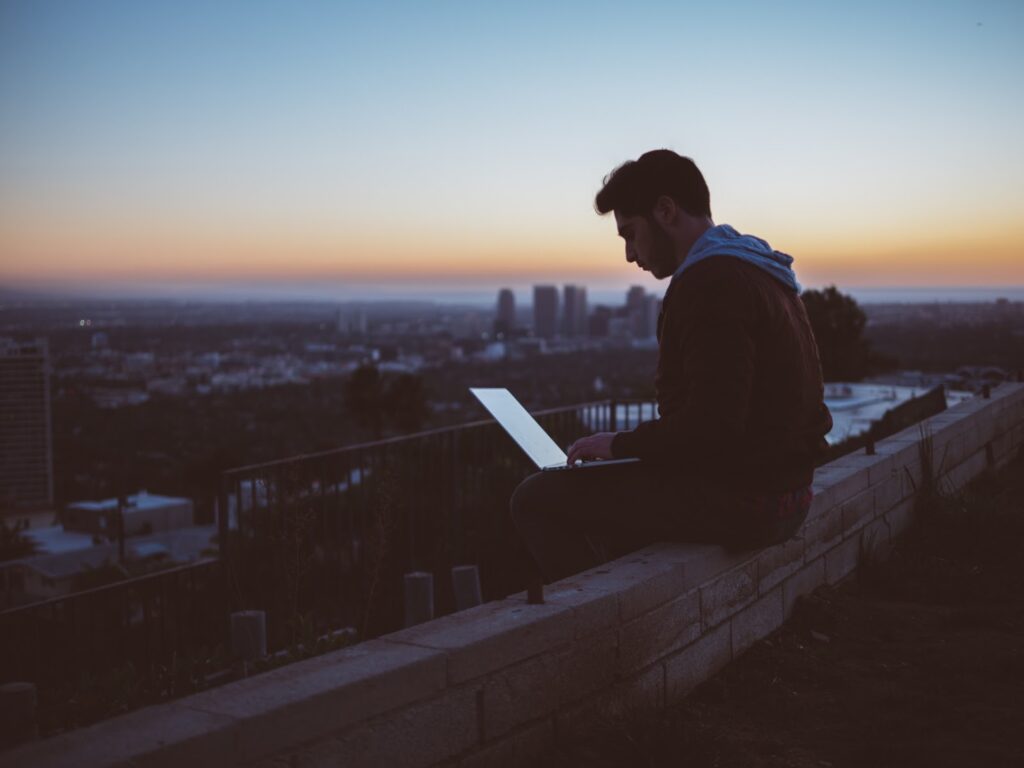a person working remotely while travel